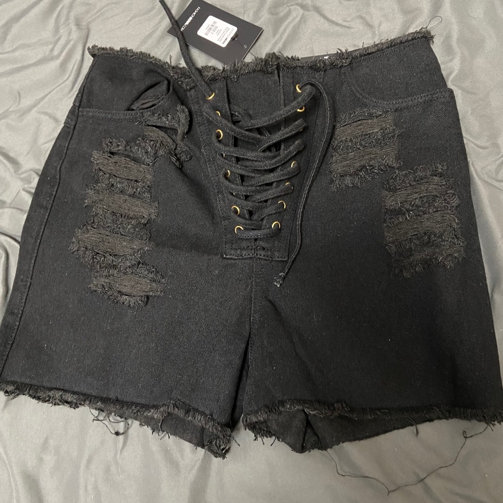 Black distressed shorts